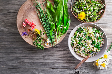 Fresh risotto with spring plants and herbs. Healthy spring food conceptの写真素材