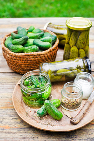 Pickled cucumbers in glass jar from home garden. Homemade cucumber picklesの写真素材