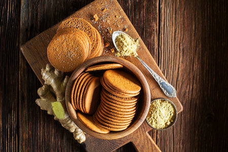 Delicious fresh homemade gingerbread cookies on rustic table backgroundの写真素材