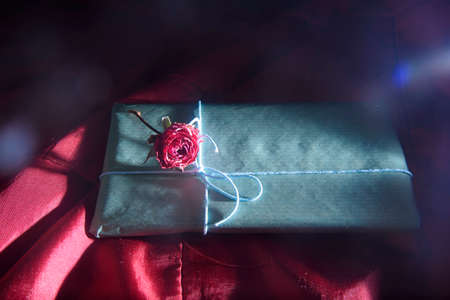 exquisite handmade chocolates. glamorous packing with rose. around the glow of lightの写真素材