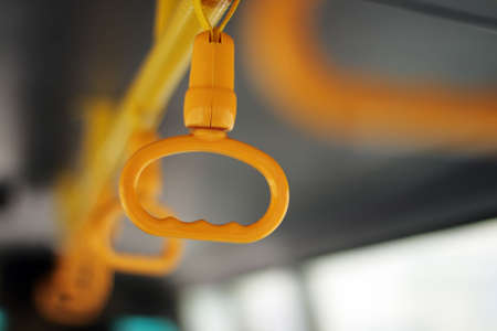 yellow bus handleの写真素材
