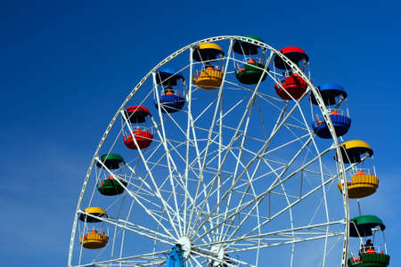 joy wheel on blue skyの写真素材