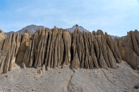 Natural rock formations created by strong winds in the cold desert mountains of Spiti Valley in the...