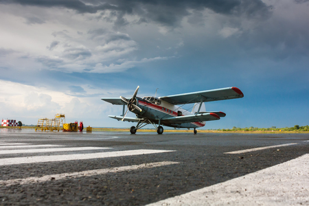 Retro plane on the airport apron after the rainのeditorial素材