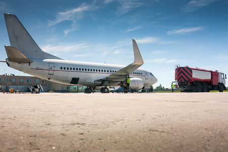 Refueling aircraft at a small airportの写真素材