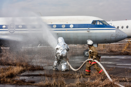 Fill the plane with fire-fighting foam after emergency landingの写真素材