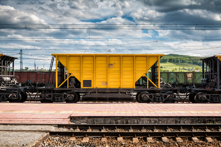 Freight railway carriages at the railroad stationの写真素材