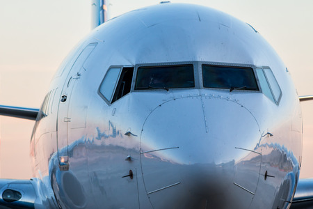 Close-up front of the fuselage of the passenger airplaneの写真素材