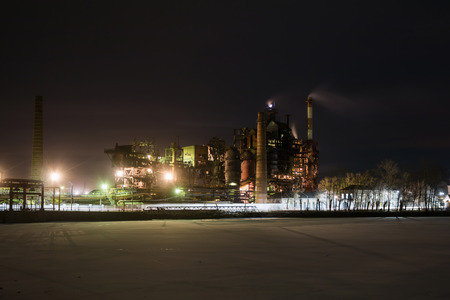 Industrial plant at winter nightの写真素材