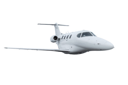 Modern luxury private jet flying isolated on white backgroundの写真素材