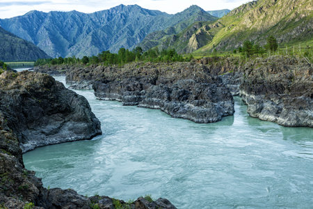 Turquoise River Valley with Picturesque Mountain Views