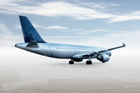 Passenger aircraft isolated on bright background with sky