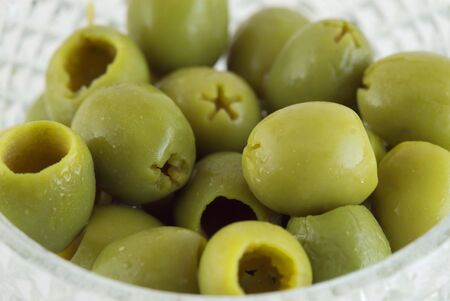 A few olives on glass dishの写真素材