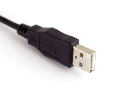Black USB cable isolated on white backgroundの写真素材