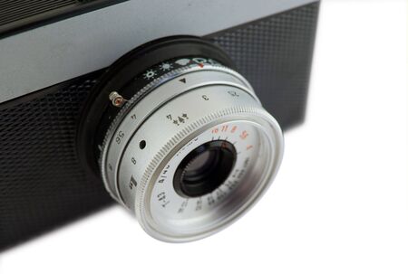 Old camera isolated on white background. Shallow depth of field.