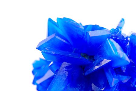 Macro of blue vitriol isolated on white backgroundの写真素材