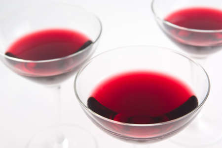 Three glasses of red white wine still lifeの写真素材