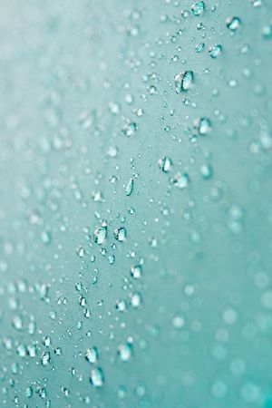 Water drops on green (shallow depth of field)の写真素材