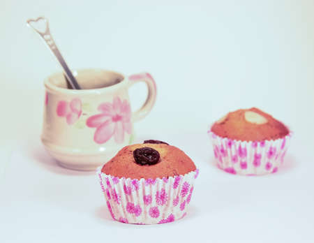 Delicious banana cakes and raisins on topの写真素材