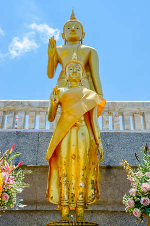 Two standing buddha statue and sky backgroundhatyai thailandの写真素材