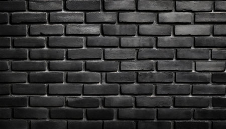 full frame of black wall brick texture backgroundの素材