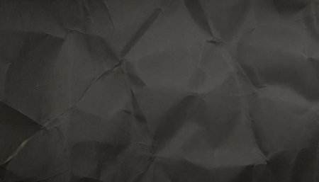 crumpled black paper backgroundの素材