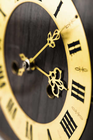 antique clock dial with Arabic numerals 