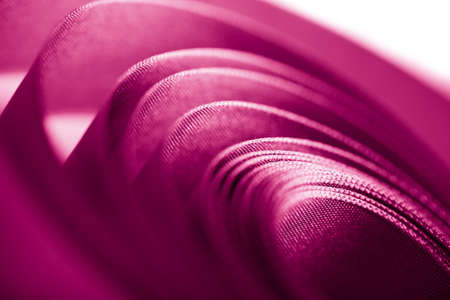 beautiful pink ribbon in spiral formの写真素材