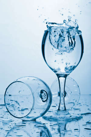 pure water splashing into glassの写真素材
