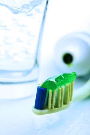 toothbrush with green toothpaste. dental care