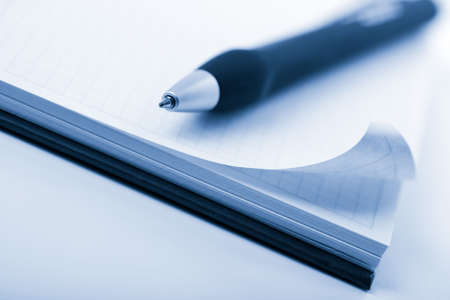 notebook and pen toned blue