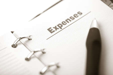 organizer and pen isolated. expenses pageの写真素材