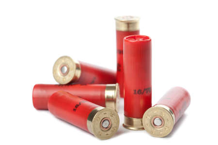 shotgun cartridges isolated over whiteの写真素材