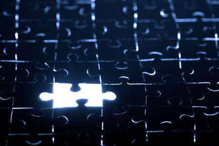 abstract puzzle background with one missing pieceの写真素材
