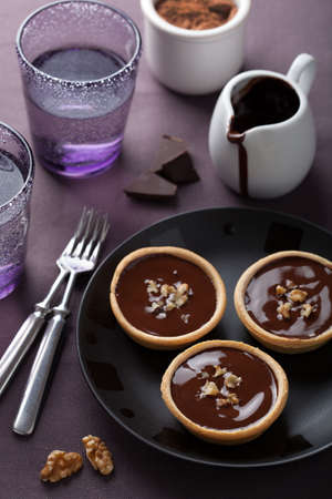tartelettes with chocolate ganache and walnuts