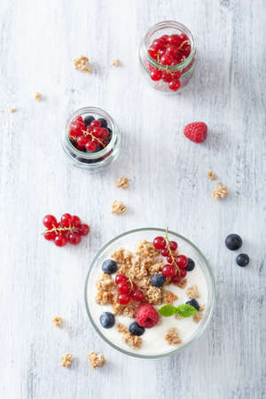healthy breakfast with yogurt and granola の写真素材