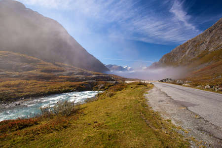 sunny and foggy road in Norway Gamle Strynefjellsvegenの写真素材