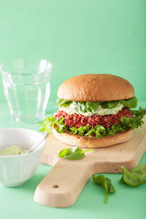 vegan beet and quinoa burger with avocado dressingの写真素材