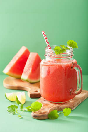 watermelon lime smoothie in mason jarsの写真素材