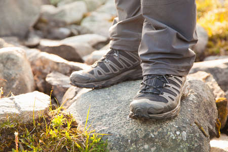 hiker standing on rocks