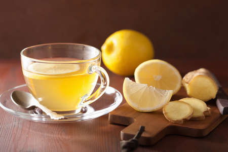 hot lemon ginger tea in glass cupの写真素材