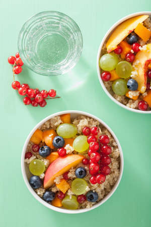 healthy breakfast quinoa with fruits berry nectarine blueberry grapeの写真素材