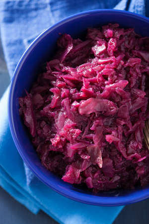pickled red cabbage in blue bowlの写真素材