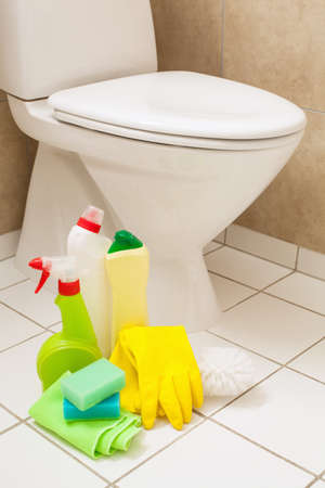 cleaning items gloves brush white toilet bowl bathroomの写真素材