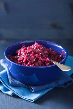 pickled red cabbage in blue bowlの写真素材