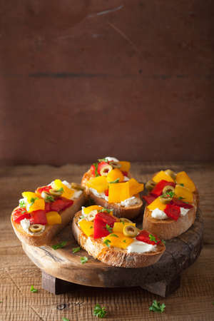 italian bruschetta with roasted peppers goat cheese olives