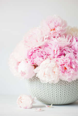 beautiful pink peony flowers bouquet in vaseの写真素材