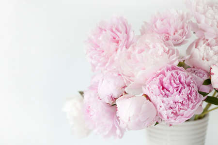 beautiful pink peony flowers bouquet in vaseの写真素材