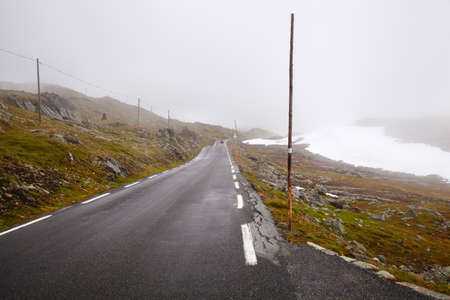 national tourist road 55 Sognefjellsvegen in misty weather, Norwayの写真素材