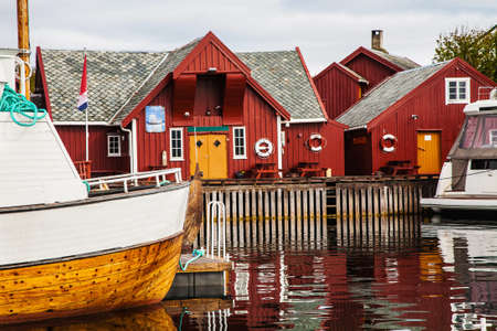 traditional fisherman houses rorbu and boats at Haholmen island, Norway